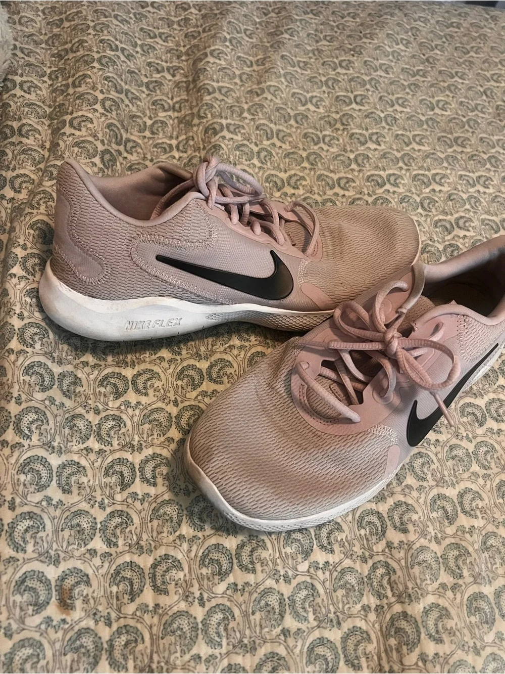 Nike Women's Light Pink Athletic Sneakers with Black Swoosh
